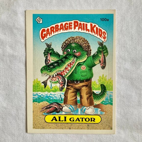 Garbage Pail Kids Card 1986 Topps - 100a Ali Gator (2 available) - Picture 1 of 4